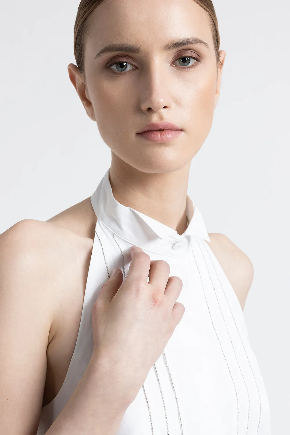 Sleeveless shirt with tuxedo collar